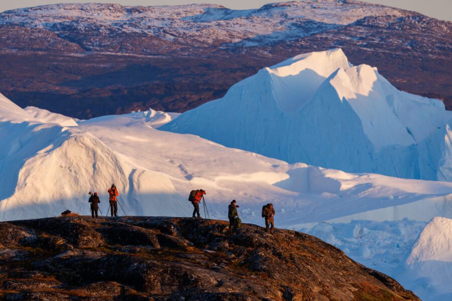Photographers gathered at the Ilulissat Icefjord on a West Greenland workshop